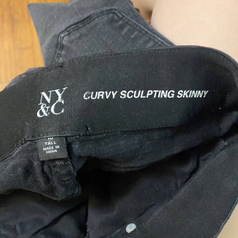 Women’s stretchy distressed jeans size 10